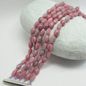 Knotted five strand pink vintage Czech bracelet